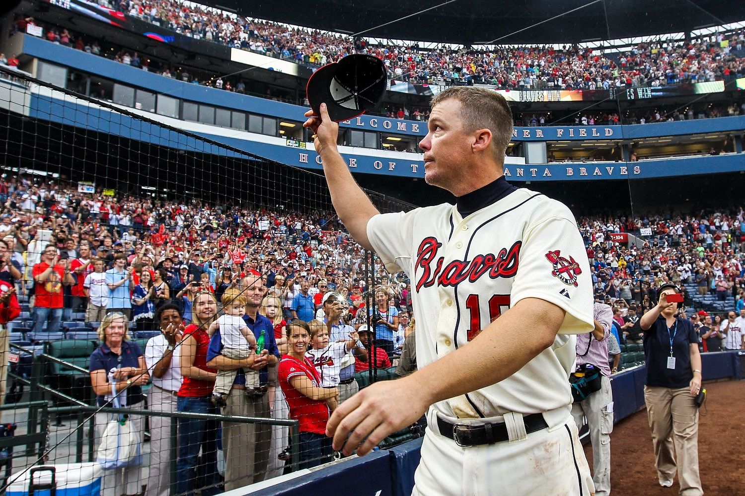 ATLANTA, GA - SEPTEMBER 30: Chipper Jones #10 of the Atlanta Braves waves his hat to fans after the game against the New York Mets at Turner Field on September 30, 2012 in Atlanta, Georgia. The Braves won 6-2. (Photo by Daniel Shirey/Getty Images)