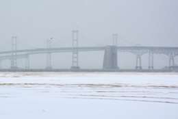 The Bay Bridge is obscured by blowing snow Thursday morning. (WTOP/Dave Dildine)