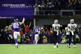MINNEAPOLIS, MN - JANUARY 14: Stefon Diggs #14 of the Minnesota Vikings runs with the ball to score a touchdown and with as time expired in the NFC Divisional Playoff game against the New Orleans Saints on January 14, 2018 at U.S. Bank Stadium in Minneapolis, Minnesota. (Photo by Hannah Foslien/Getty Images)