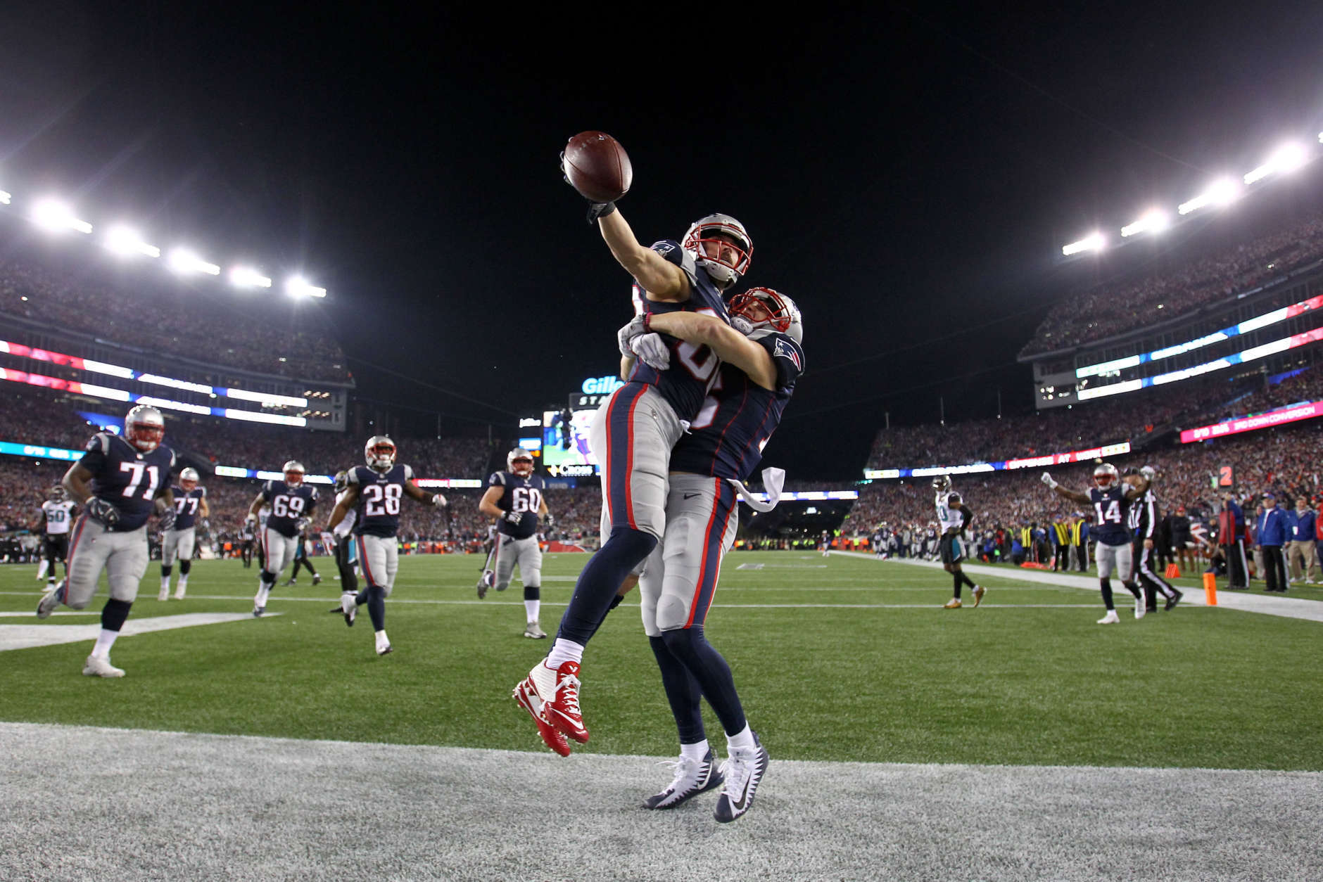 FOXBOROUGH, MA - JANUARY 21:  Danny Amendola #80 of the New England Patriots celebrates a touchdown with Chris Hogan #15 in the fourth quarter during the AFC Championship Game against the Jacksonville Jaguars at Gillette Stadium on January 21, 2018 in Foxborough, Massachusetts.  (Photo by Jim Rogash/Getty Images)