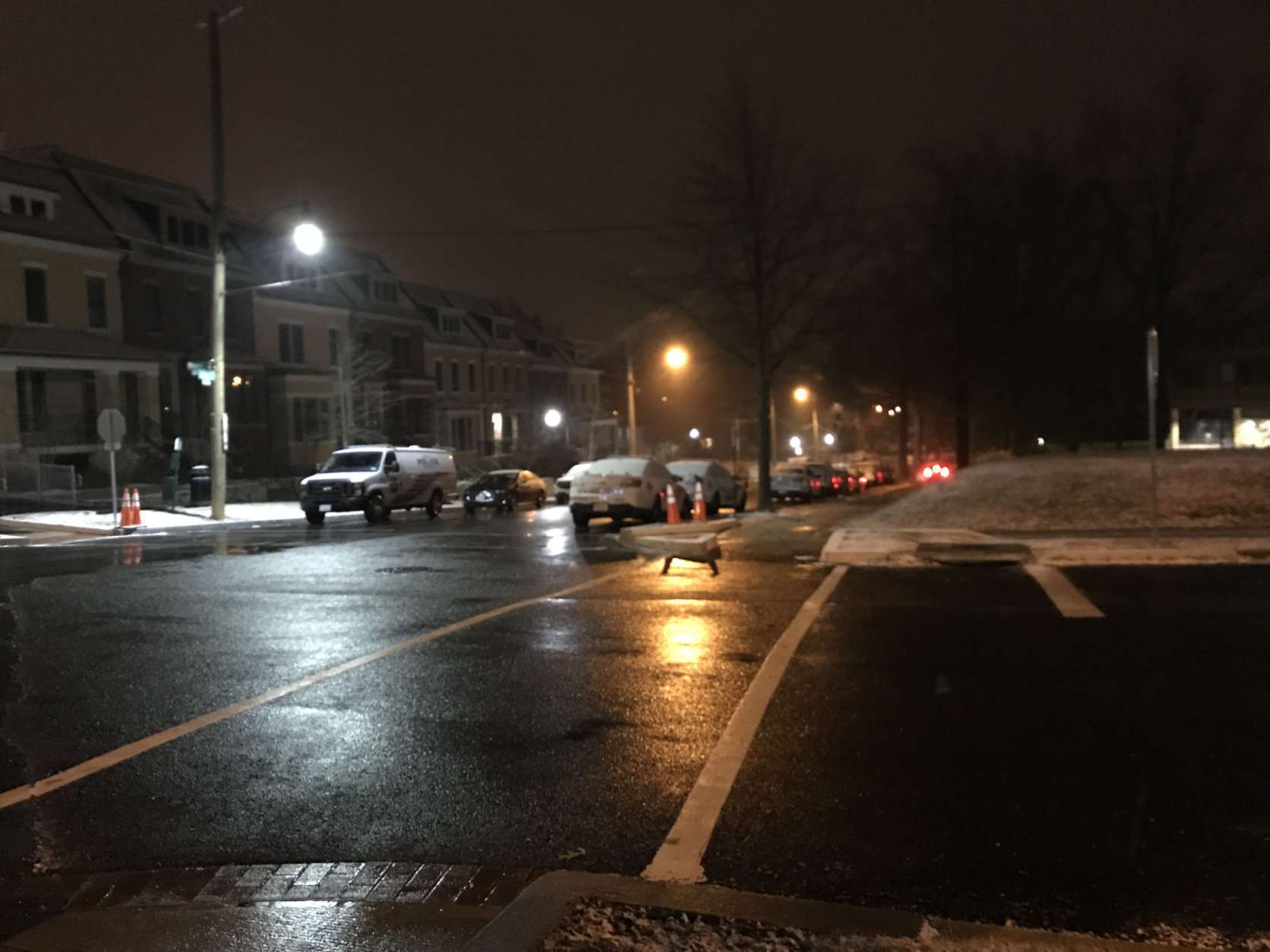 Main roads are wet but not too slick in Northwest D.C. Wednesday morning. (WTOP/Reem Nadeem)