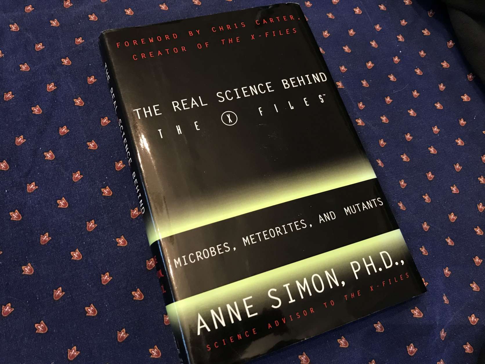 As science adviser for "The X-Files," University of Maryland virologist Anne Simon wrote a book detailing the facts behind the series. (WTOP/Michelle Basch)