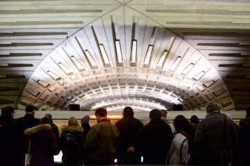 Passengers wait to board a Red Line train at Metro Center on Feb. 16, 2017. (WTOP/Dave Dildine)