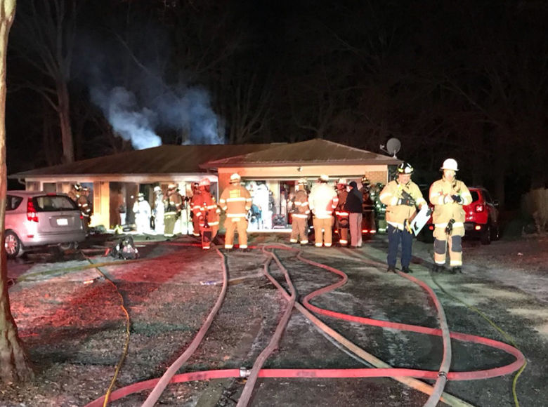 Smoke could still be seen rising from the scene of a fatal fire on Columbia Road in Annandale, Virginia. (WTOP/Neal Augenstein)