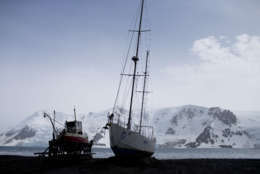 In this Jan. 27, 2015 photo, boats sit on the beach at Bahia Almirantazgo, Antarctica. Most visitors arrive on the Antarctic Peninsula, accessible from southern Argentina and Chile by plane or ship. The next most popular destination is the Ross Sea on the opposite side of the continent, which visitors reach after sailing 10 days from New Zealand or Australia. (AP Photo/Natacha Pisarenko)
