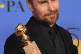 Actor Sam Rockwell holds his award for Best Performance by an Actor in a Supporting Role in any Motion Picture in the press room during The 75th Annual Golden Globe Awards at The Beverly Hilton Hotel on January 7, 2018 in Beverly Hills, California.  (Photo by Kevin Winter/Getty Images)