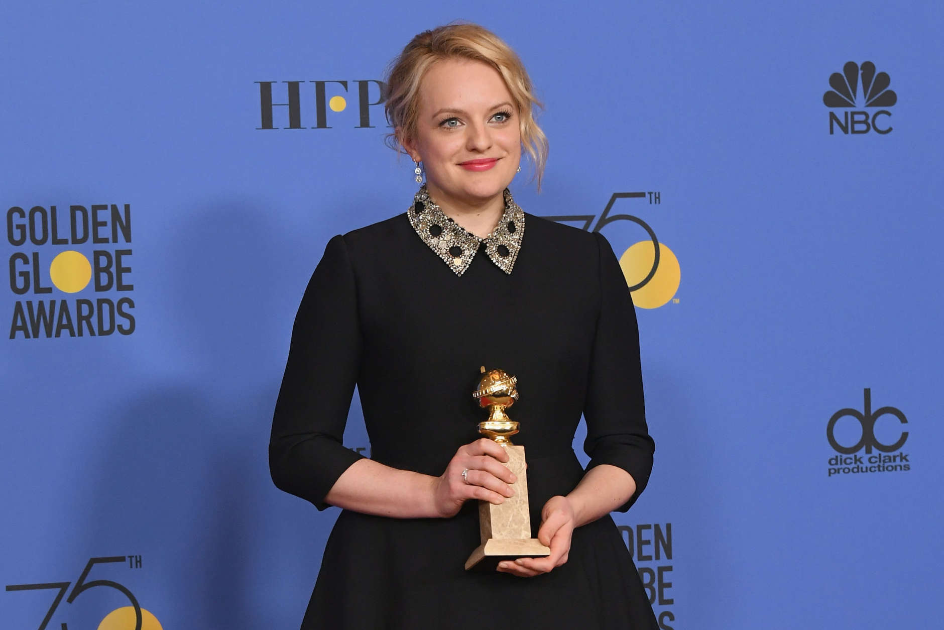 Producer Elisabeth Moss of 'The Handmaid's Tale' poses with the award for Best Television Series Drama in the press room during The 75th Annual Golden Globe Awards at The Beverly Hilton Hotel on January 7, 2018 in Beverly Hills, California.  (Photo by Kevin Winter/Getty Images)