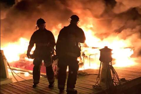 DC firefighters battle a blaze on the water