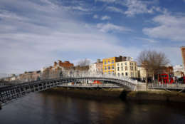 Ha'Penny Bridge is shown on the river Liffey in Dublin, Ireland on Monday, Feb. 16, 2009.  (AP Photo/Peter Morrison)