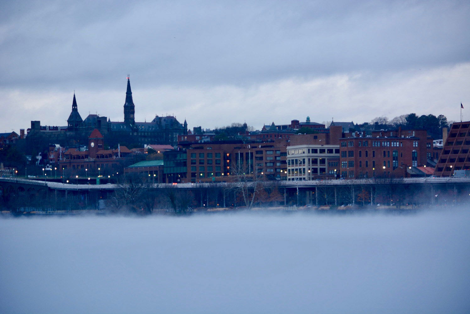 Georgetown is seen across a blanket of fog on the Potomac River on Friday, Jan. 12, 2018. (WTOP/Dave Dildine)