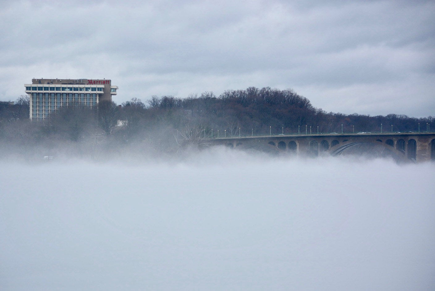 Dense fog swirls up toward the Key Bridge on Friday, Jan. 12, 2018. (WTOP/Dave Dildine)