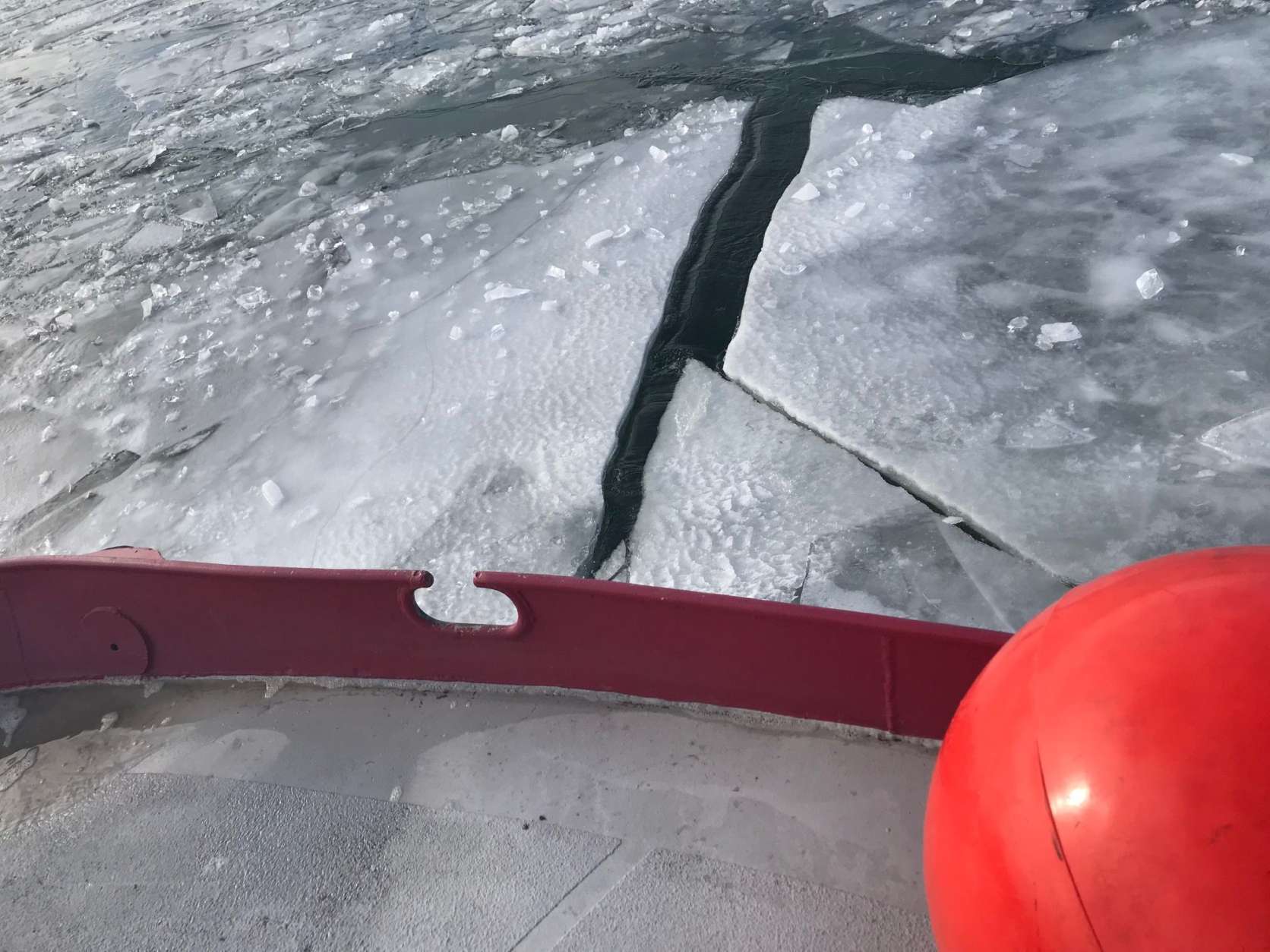 The thickness of the ice varies throughout the connected waterways depending on how many times the vessel has broken up the path and on the shade. (WTOP/Megan Cloherty)