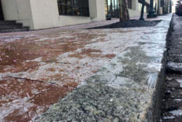 Ice coats the sidewalk in Rockville, Maryland, in January 2018. (WTOP/Nick Iannelli)
