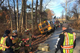 In Montgomery County, Maryland, a school bus with several passengers aboard slid off the road on Tulip Lane at around 8:45 a.m., according to Montgomery County Fire and Rescue spokesman Pete Piringer. All occupants were safely removed from the bus and no one was seriously injured. (Courtesy Montgomery County Fire and Rescue)