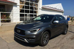 The front end has the latest in Infiniti styling with a large grill with smaller, streamlined headlight units that house LED lights and seem to wrap around the front to the side of the car. (WTOP/Mike Parris)