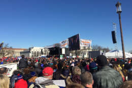 March for Life participants watch as President Donald Trump addresses the crowd on Jan. 19, 2018. (WTOP/Mike Murillo)