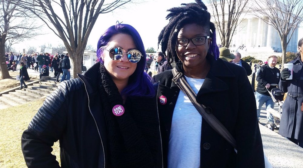 Destiny Herndon-De La Rosa and Cessilye Smith, leaders in a group called New Wave Feminists, attended the march this year and last year. (WTOP/Kathy Stewart)