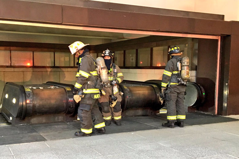 Photo shows firefighters at a Metro subway station
