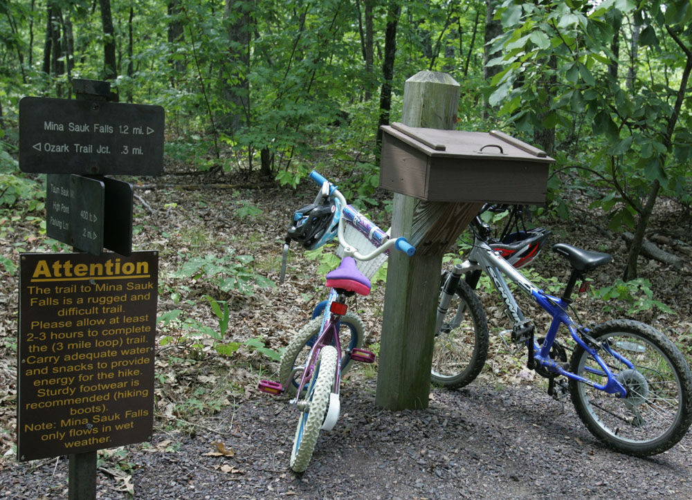 ** FOR IMMEDIATE RELEASE **Children's bicycles are parked near the entrance to a section of the Ozark Trail at the Taum Sauk Mountain State Park entrance in Missouri Sunday, Sept. 3, 2006. While some sections that go through wilderness are off-limits to anyone but hikers, backpackers and equestrians, other parts are open to off-road cyclist (not motorized). The riders of the bicycles were parked by children walking toward the start of the Ozark Trail. (AP Photo/James A. Finley)