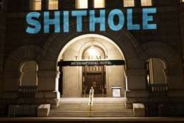 The word shithole was projected onto Trump Hotel in D.C. on Saturday. (Courtesy Sorane Yamahira/Bell Visuals)