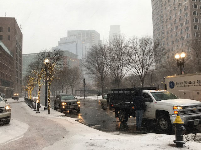 WTOP's Steve Dresner captured a photo of a snowy Boston street on Thursday. (WTOP/Steve Dresner) 