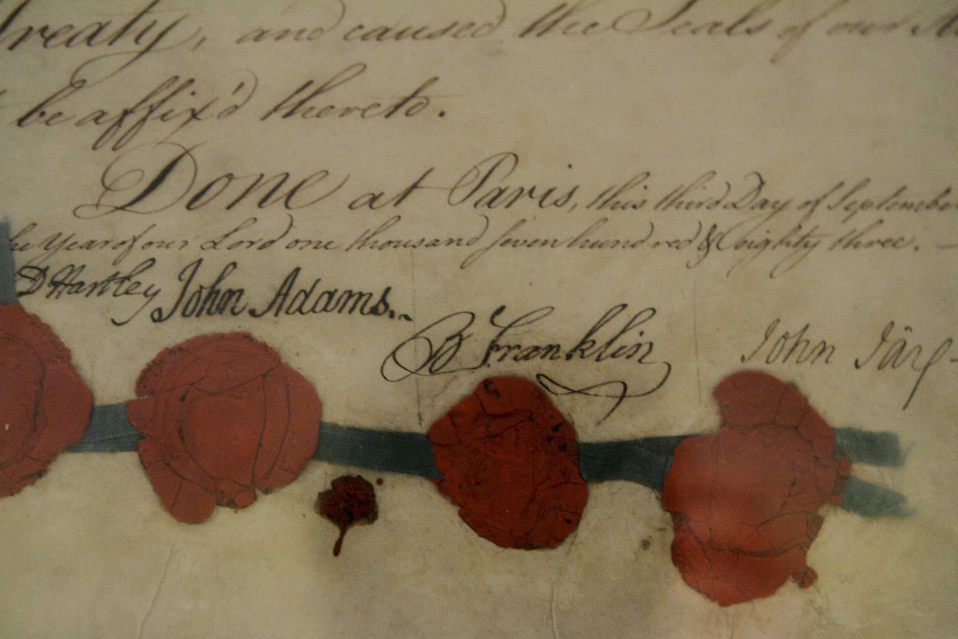 A detail photo of the Definitive Treaty of Peace between the United Sates and Great Britain dated Sept. 3, 1783, also know as the Treaty of Paris, is seen during a media preview, Thursday, Aug. 21, 2008, at the National Archives in Washington. The signatures of John Adams and Benjamin Franklin are seen at lower center. (AP Photo/Haraz N. Ghanbari)