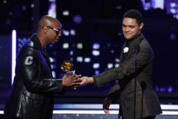 NEW YORK, NY - JANUARY 28:  Comedian Dave Chappelle (L) accepts Best Comedy Album for 'The Age of Spin'/'Deep in the Heart of Texas' from TV personality Trevor Noah onstage during the 60th Annual GRAMMY Awards at Madison Square Garden on January 28, 2018 in New York City.  (Photo by Kevin Winter/Getty Images for NARAS)