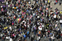 A women's march moves toward the Texas State Capitol on the one-year anniversary of President Donald Trump's inauguration, Saturday, Jan. 20, 2018, in Austin, Texas. (AP Photo/Eric Gay)