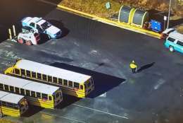 The scene where a bus driver was struck by a Prince William County school bus in Bristow, Virginia. (NBC Washington)