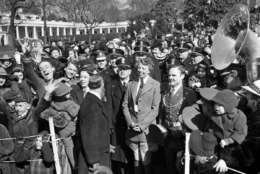 First Lady Eleanor Roosevelt surrounded by Secret Service agents and White House police at the Annual Easter Egg Roll at the White House, March 25, 1940. (AP Photo)
