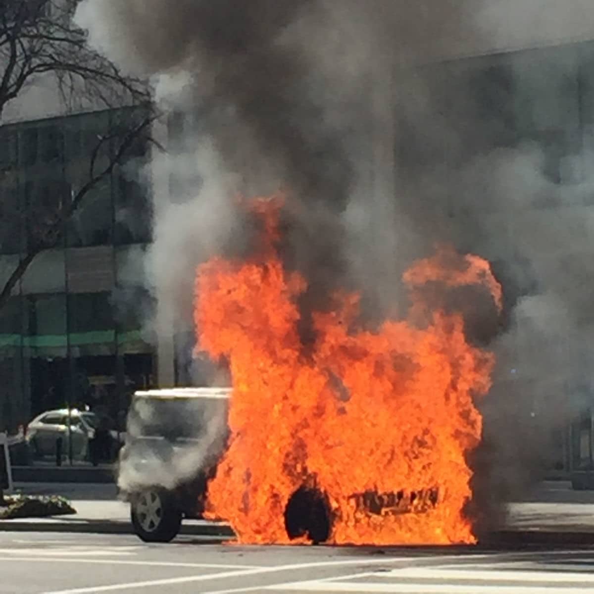 A jeep caught fire in downtown D.C. Tuesday afternoon. (Courtesy Suzanne Raven)