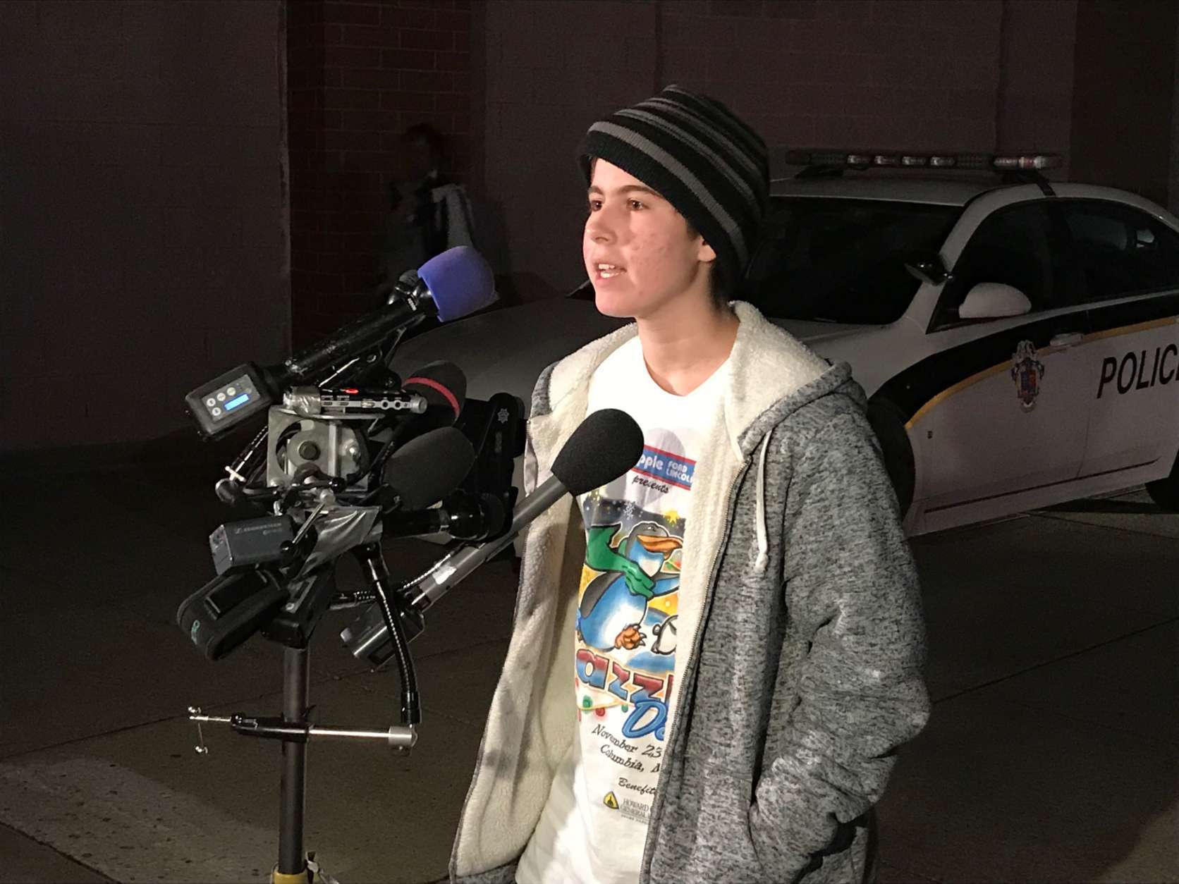 Charlie Summers, a 9th grader at Einstein High School., speaks in front of the media Monday night. (WTOP/Michelle Basch)