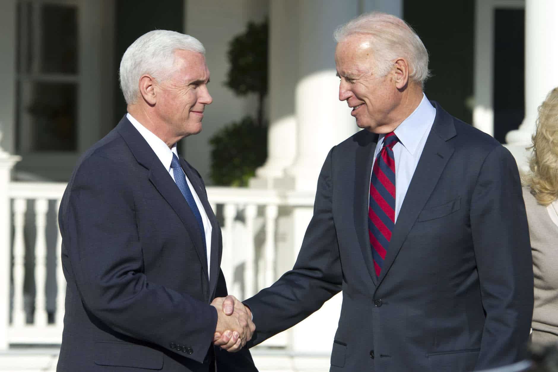 Vice President Joe Biden shakes hands with Vice President-elect Mike Pence after they had lunch at the Vice President's residence, the Naval Observatory, in Washington, Wednesday, Nov. 16, 2016. (AP Photo/Cliff Owen)