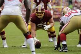 Washington Redskins center Spencer Long, center, prepares to snap the ball during an NFL football game against the San Fransisco 49ers, Sunday, Oct. 15, 2017, in Landover, Md. (AP Photo/Mark Tenally)