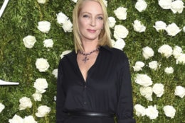 FILE - In this June 11, 2017 file photo, Uma Thurman arrives at the 71st annual Tony Awards in New York. Thurman wished everyone a happy Thanksgiving except disgraced movie mogul Harvey Weinstein, saying in a cryptic online post that he doesn’t “deserve a bullet.”  Thurman starred in the Weinstein-produced films “Pulp Fiction” and the “Kill Bill” films. (Photo by Evan Agostini/Invision/AP, File)