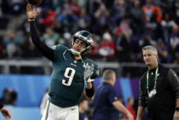 Philadelphia Eagles quarterback Nick Foles (9), warms up before the NFL Super Bowl 52 football game against the New England Patriots, Sunday, Feb. 4, 2018, in Minneapolis. (AP Photo/Frank Franklin II)