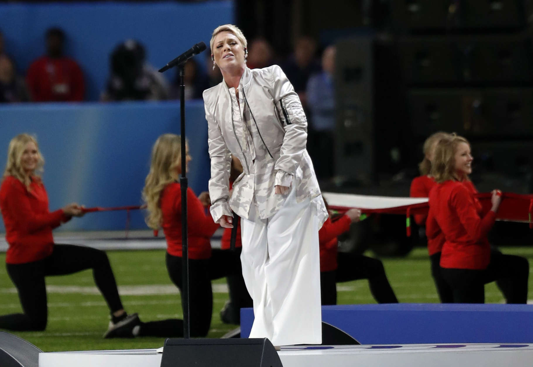 Pink performs the National Anthem, before the NFL Super Bowl 52 football game between the Philadelphia Eagles and the New England Patriots, Sunday, Feb. 4, 2018, in Minneapolis. (AP Photo/Tony Gutierrez)