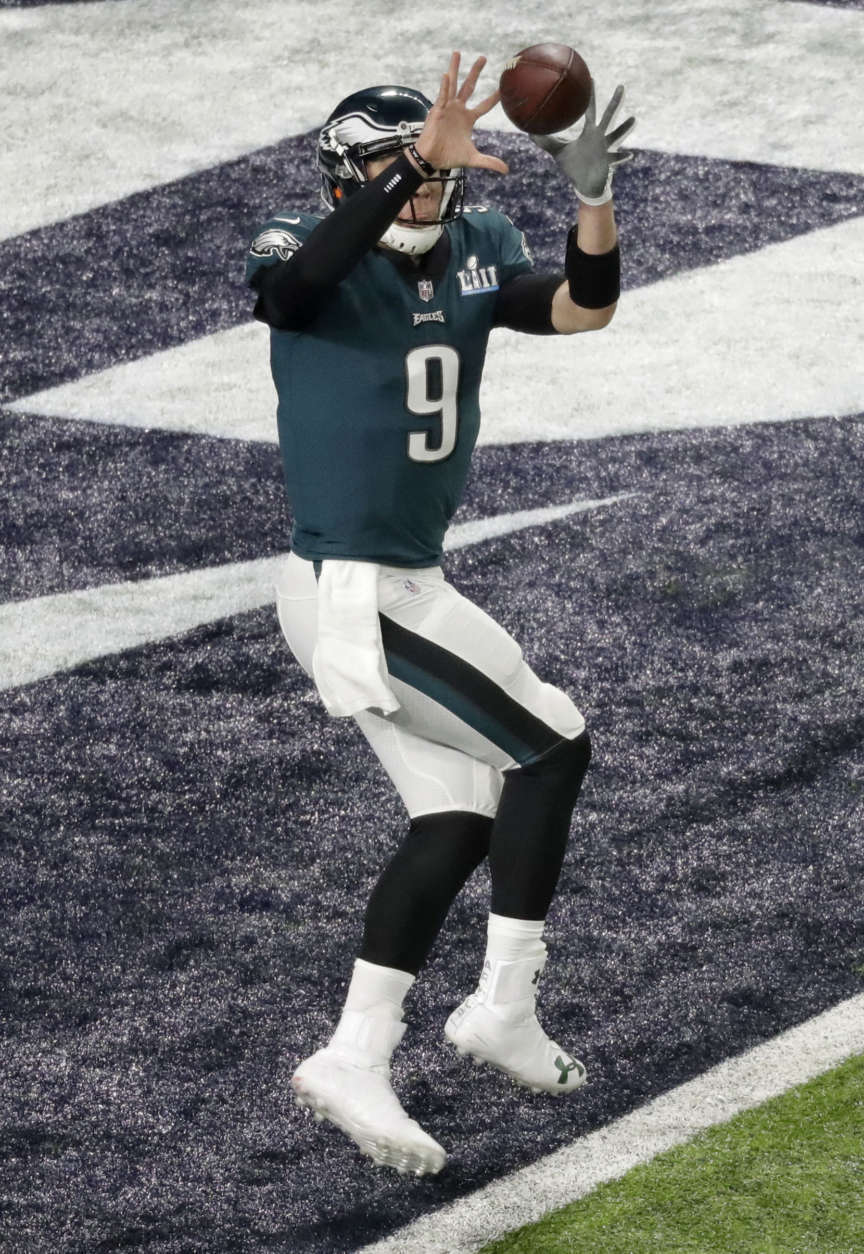 Philadelphia Eagles quarterback Nick Foles catches a pass for a touchdown against the New England Patriots during the first half of the NFL Super Bowl 52 football game Sunday, Feb. 4, 2018, in Minneapolis. (AP Photo/Eric Gay)