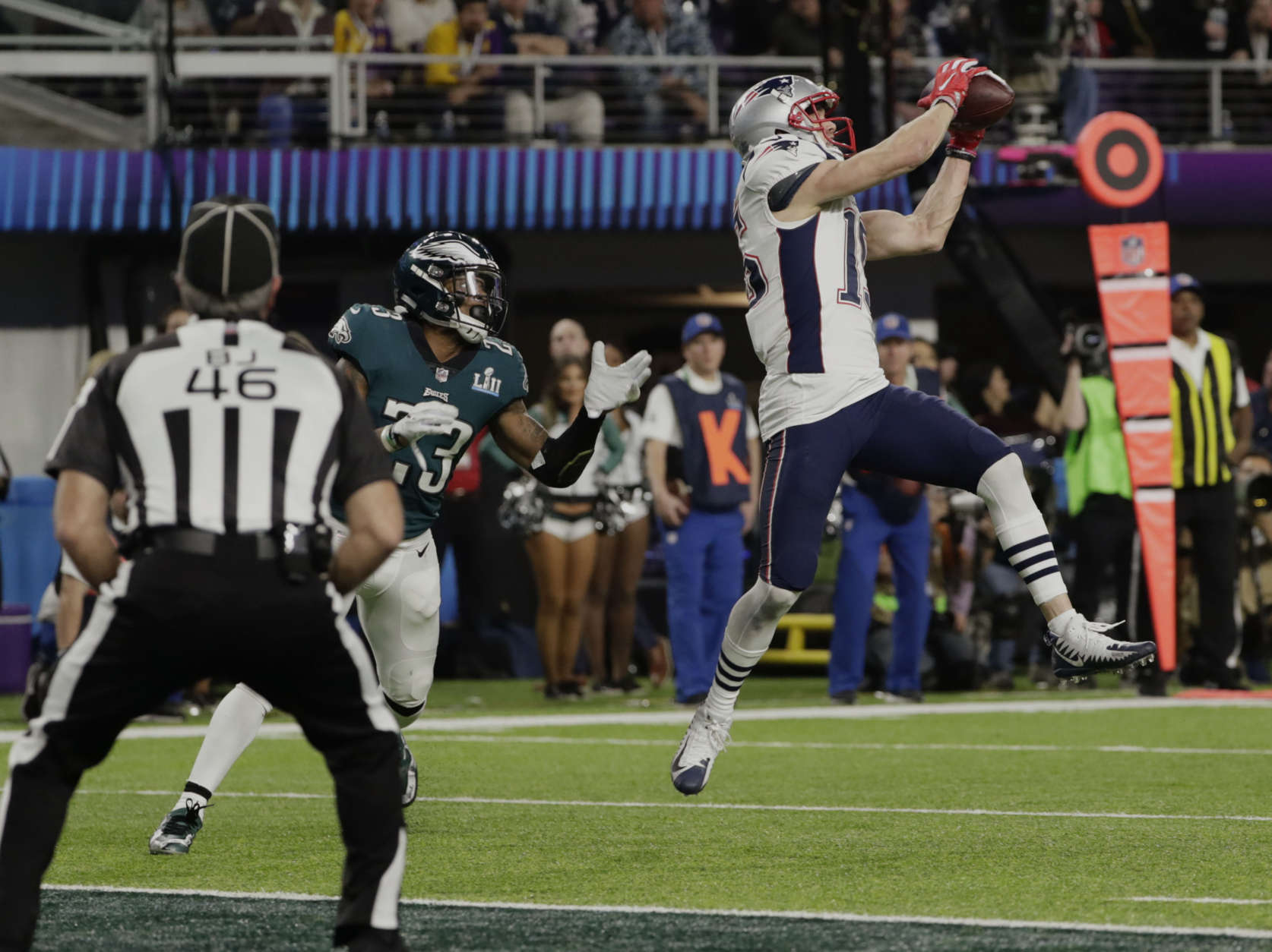 New England Patriots wide receiver Chris Hogan (15) makes a touchdown reception against Philadelphia Eagles free safety Rodney McLeod (23), during the second half of the NFL Super Bowl 52 football game, Sunday, Feb. 4, 2018, in Minneapolis. (AP Photo/Frank Franklin II)