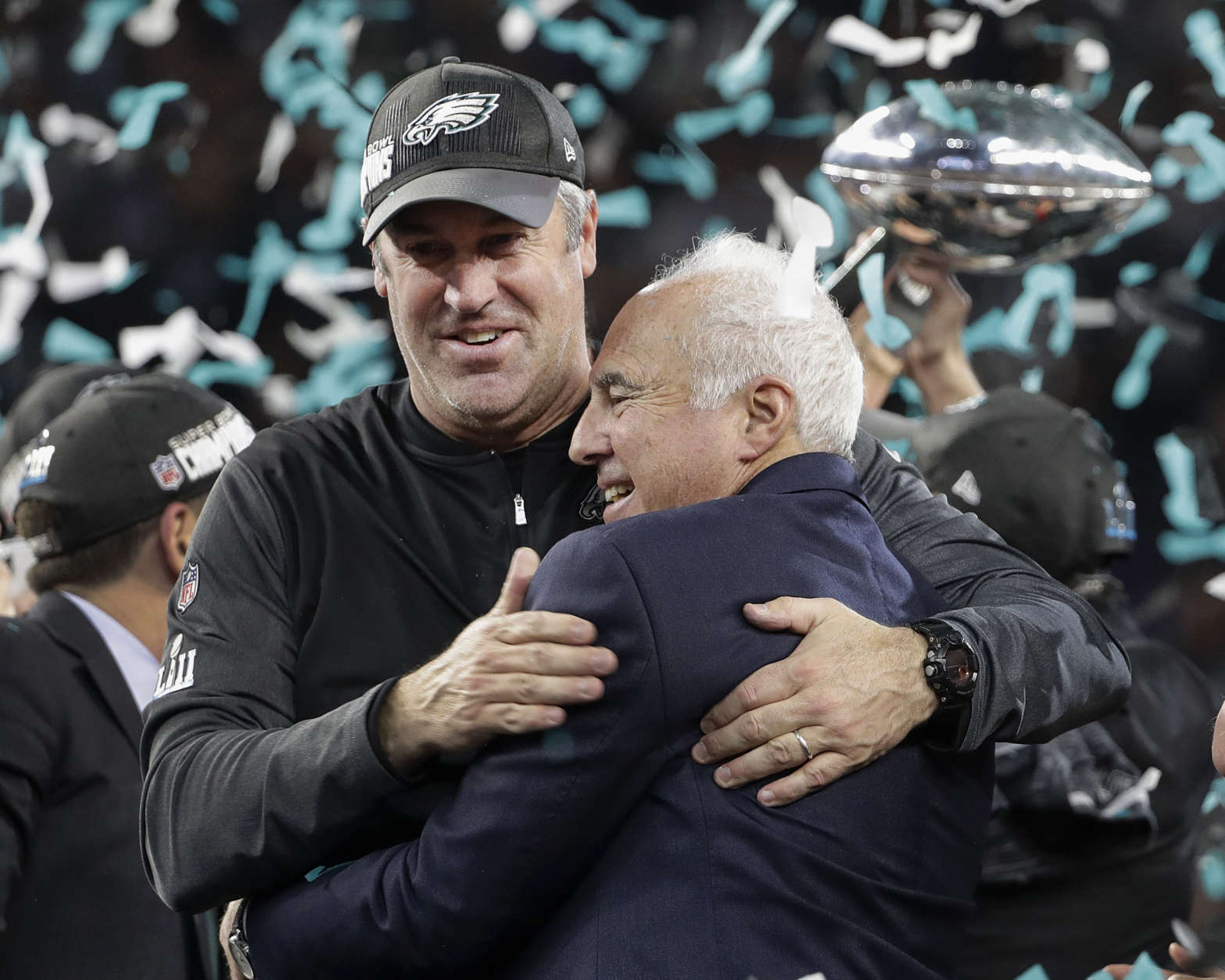 Philadelphia Eagles owner Jeffrey Lurie, right, and head coach Doug Pederson celebrate after the NFL Super Bowl 52 football game against the New England Patriots, Sunday, Feb. 4, 2018, in Minneapolis. The Eagles won 41-33. (AP Photo/Chris O'Meara)