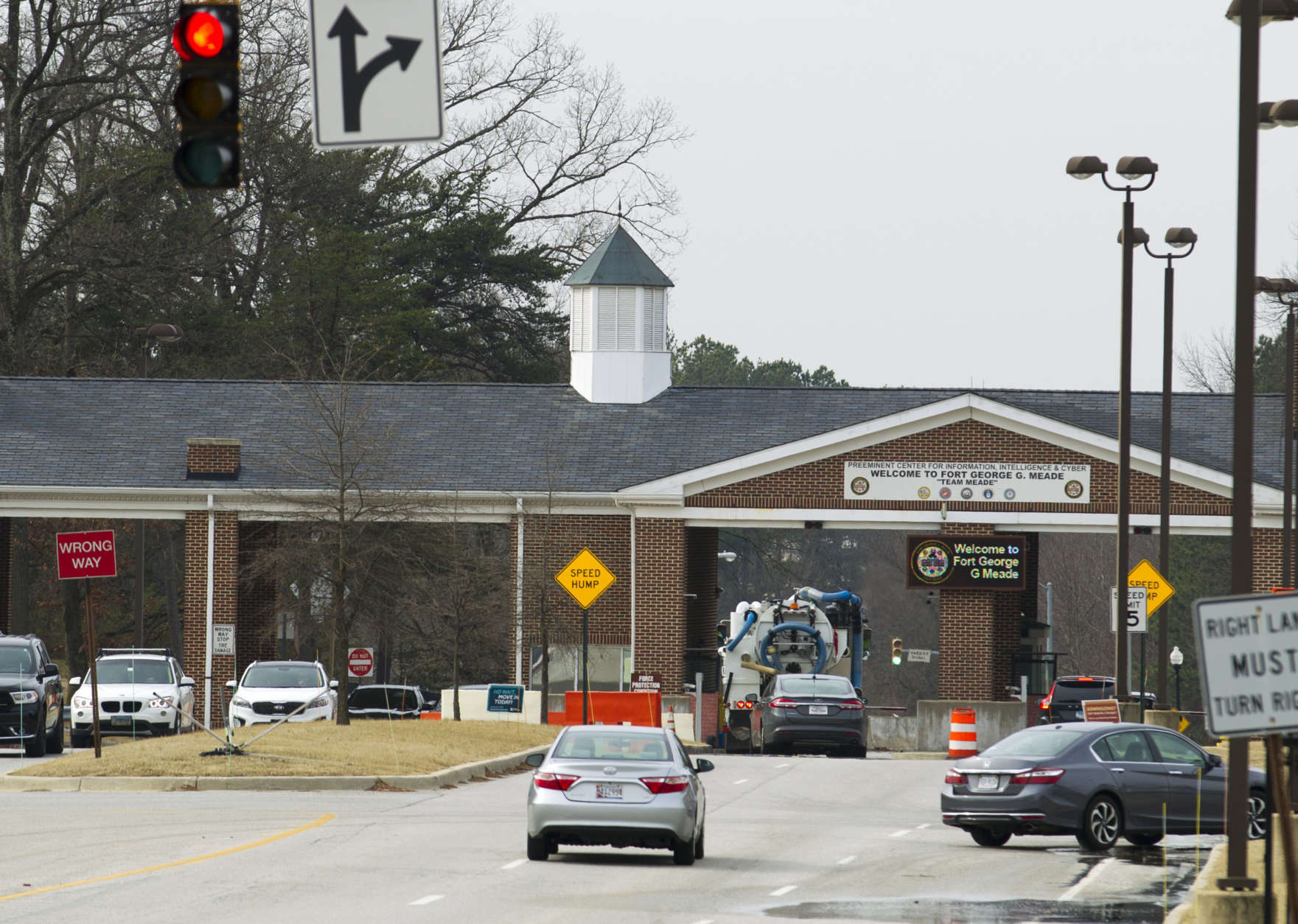 Fort Meade gate next to the The National Security Agency is seen Wednesday, Feb. 14, 2018, in Fort Meade, Md. One person was wounded in a shooting Wednesday morning outside the National Security Agency campus at Fort Meade. (AP Photo/Jose Luis Magana)