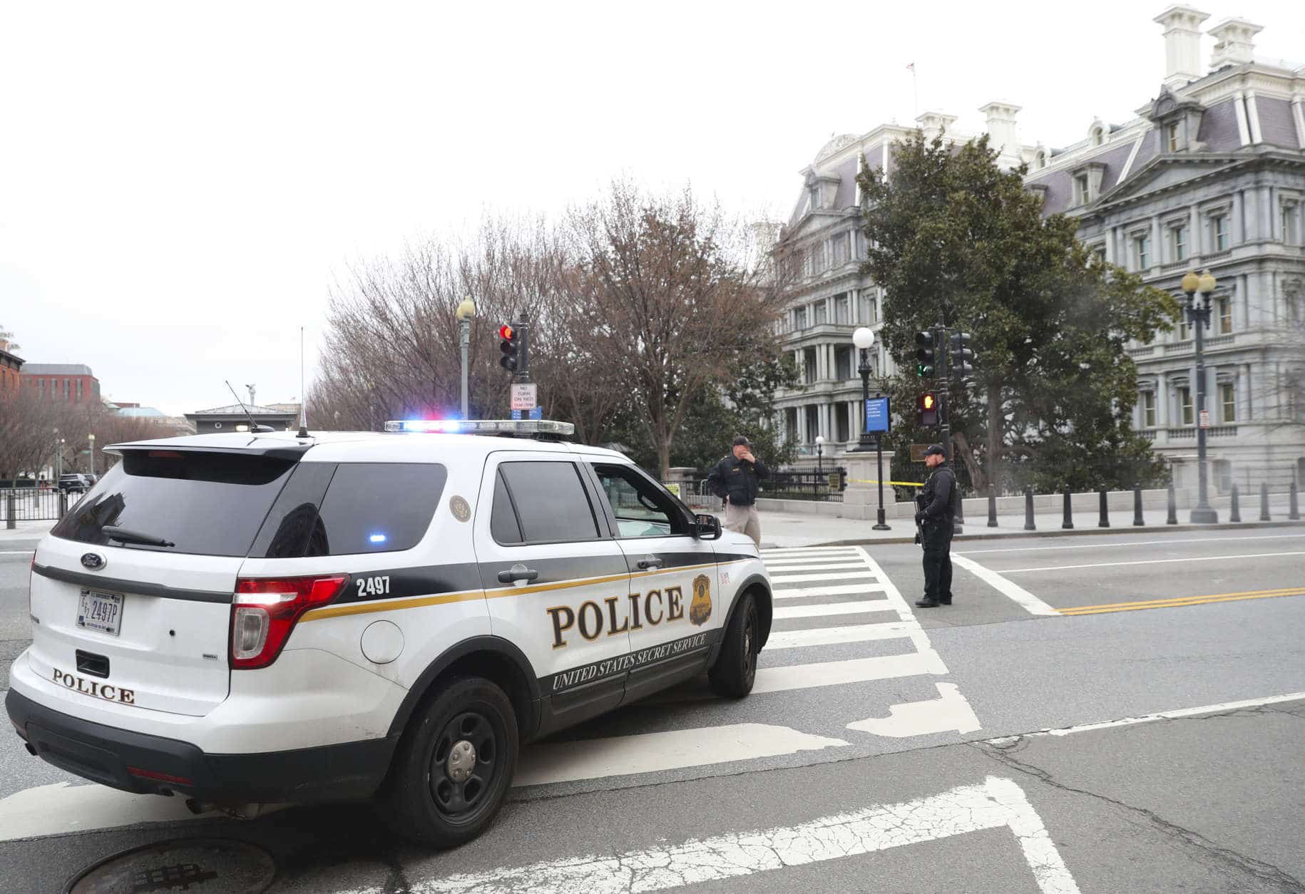 17th Street NW near the White House in Washington is closed as Secret Service officer after a vehicle rammed into a security barrier near the White House, Friday, Feb. 23, 2018, in Washington. (AP Photo/Pablo Martinez Monsivais)
