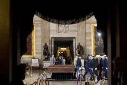 Military members practice placing a casket in the Rotunda of the Capitol, Tuesday, Feb. 27, 2018  in Washington, for the late Rev. Billy Graham to lie in honor tomorrow.  President Tump, Congressional leaders and the Graham family will be in attendance.  (AP Photo/Andrew Harnik)