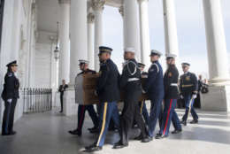 A Military Honor Guard carries the casket of Reverend Billy Graham as it arrives at the US Capitol in Washington, Feb. 28, 2018, prior to a lying in honor ceremony in the Capitol Rotunda. (Saul Loeb/Pool via AP)