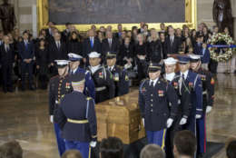 The body of Rev. Billy Graham is carried into the Capitol Rotunda where he will lie in honor as President Donald Trump, officials and dignitaries pay tribute to America's most famous evangelist, Wednesday, Feb. 28, 2018, in Washington. The North Carolina-born farm boy became a media-savvy Southern Baptist minister and spiritual adviser to numerous presidents, reaching millions around with the world with his rallies — or what he called "crusades" — through his pioneering use of television. (AP Photo/J. Scott Applewhite)