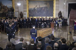 The body of Rev. Billy Graham, who died last week at age 99, lies in the Capitol Rotunda as President Donald Trump, officials and dignitaries pay tribute to America's most famous evangelist, Wednesday, Feb. 28, 2018, in Washington. The North Carolina-born farm boy became a media-savvy Southern Baptist minister and spiritual adviser to numerous presidents, reaching millions around with the world with his rallies — or what he called "crusades" — through his pioneering use of television. (AP Photo/J. Scott Applewhite)