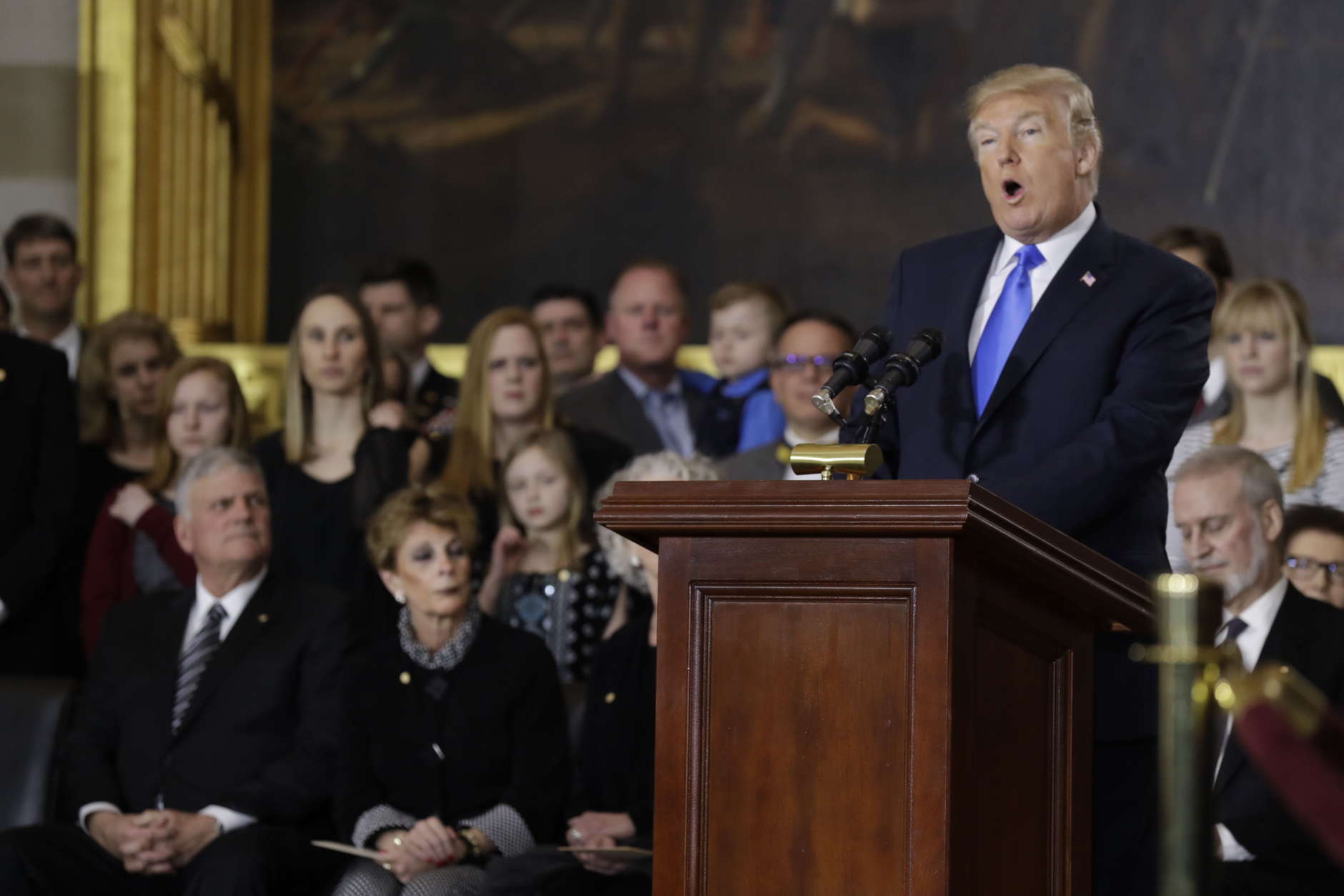 President Donald Trump participates in a ceremony honoring Reverend Billy Graham in the Rotunda of the U.S. Capitol building, Wednesday, Feb. 28, in Washington. (AP Photo/Evan Vucci)