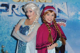Elsa the Snow Queen, left, and Princess Anna attend Frozen celebrity premiere presented by Disney On Ice held at the Staples Center on Thursday, Dec.10, 2015, in Los Angeles. (Photo by Richard Shotwell/Invision/A P)