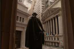 **ADVANCE FOR FRIDAY, FEB. 1--FILE** A bronze statue of George Washington looks out along Broad St. and the New York Stock Exchange on Presidents' Day in this Feb. 19, 1996 file photo, from the steps of New York's Federal Hall, where the nation's first president was sworn into office on April 30, 1789. (AP Photo/Ed Bailey, file)