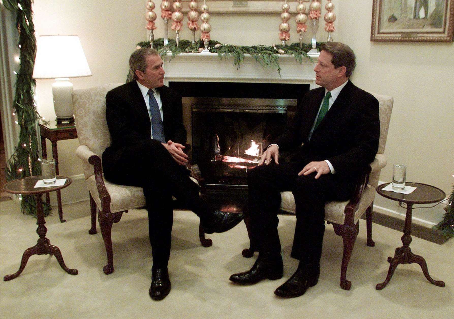 President-elect Bush, left, meets with Vice President Al Gore in the living room of the vice presidential residence in Washington, Tuesday, Dec. 19, 2000. Tuesday's fireside talk lasted just 15 minutes, hardly long enough to close the breach opened during a hard-fought campaign and rancorous postelection tussle.(AP Photo/Doug Mills, POOL)